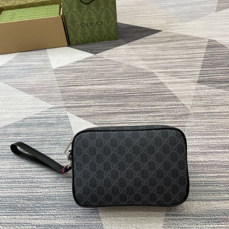 G*u*i clutch bags